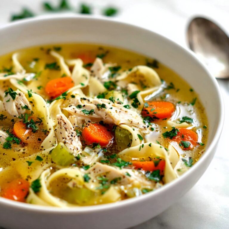 Creamy Chicken Noodle Soup with Fresh Vegetables and Herbs Recipe