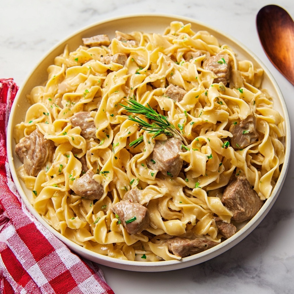 Easy Crockpot Cheesy Beef and Noodles Recipe - Recipe Image