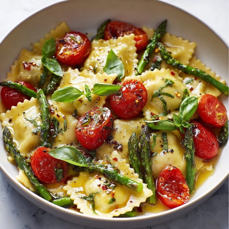 Ravioli with Tomatoes, Asparagus, Garlic, and Herbs Recipe