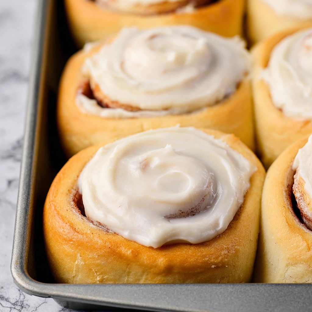 Homemade Cinnamon Rolls with Maple Cream Cheese Frosting Recipe - Recipe Image
